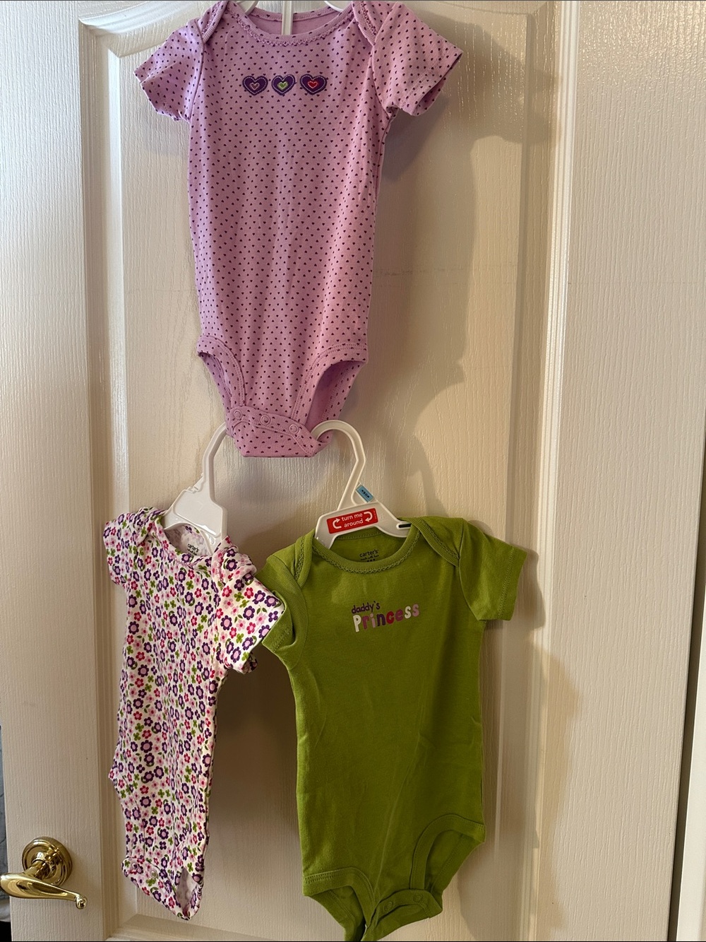 Carter's Three-Pack Baby One-Pieces in Lavender, Floral, and Green